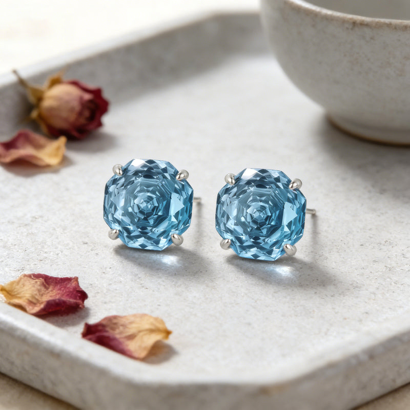 Sterling silver light blue octagon gemstone stud earrings
